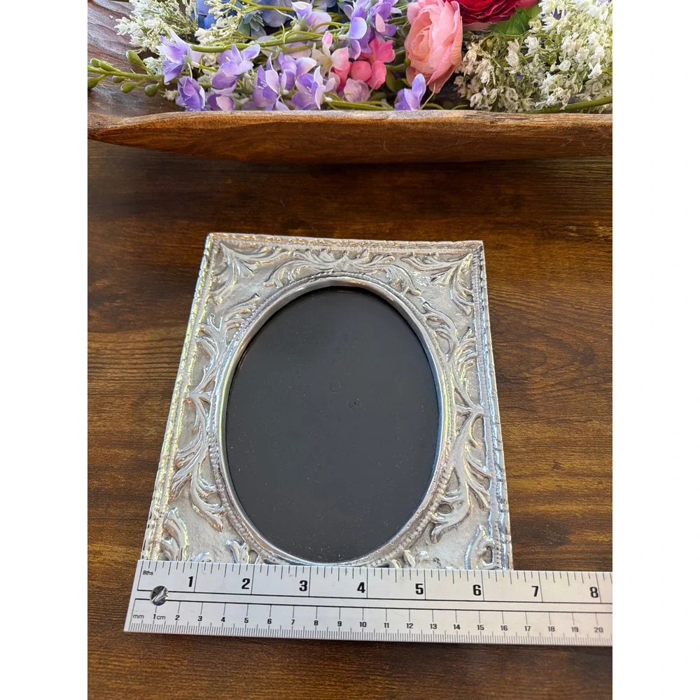 Vintage Ornate Silver Embossed Picture Frame Oval Opening Scrollwork Tabletop